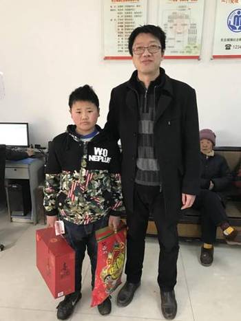 浓浓真情温暖孤儿心