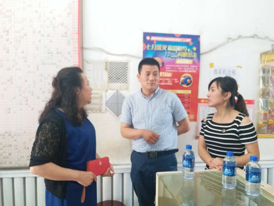 省福彩中心副主任李悦与大庆市福彩中心龙茂杰主任走访林甸县投注站