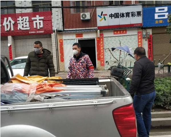 筑牢疫情防控安全线 体彩人兼职社区“守门员”